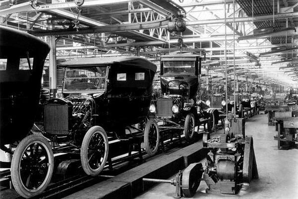 Ford cars rolling off the assembly line